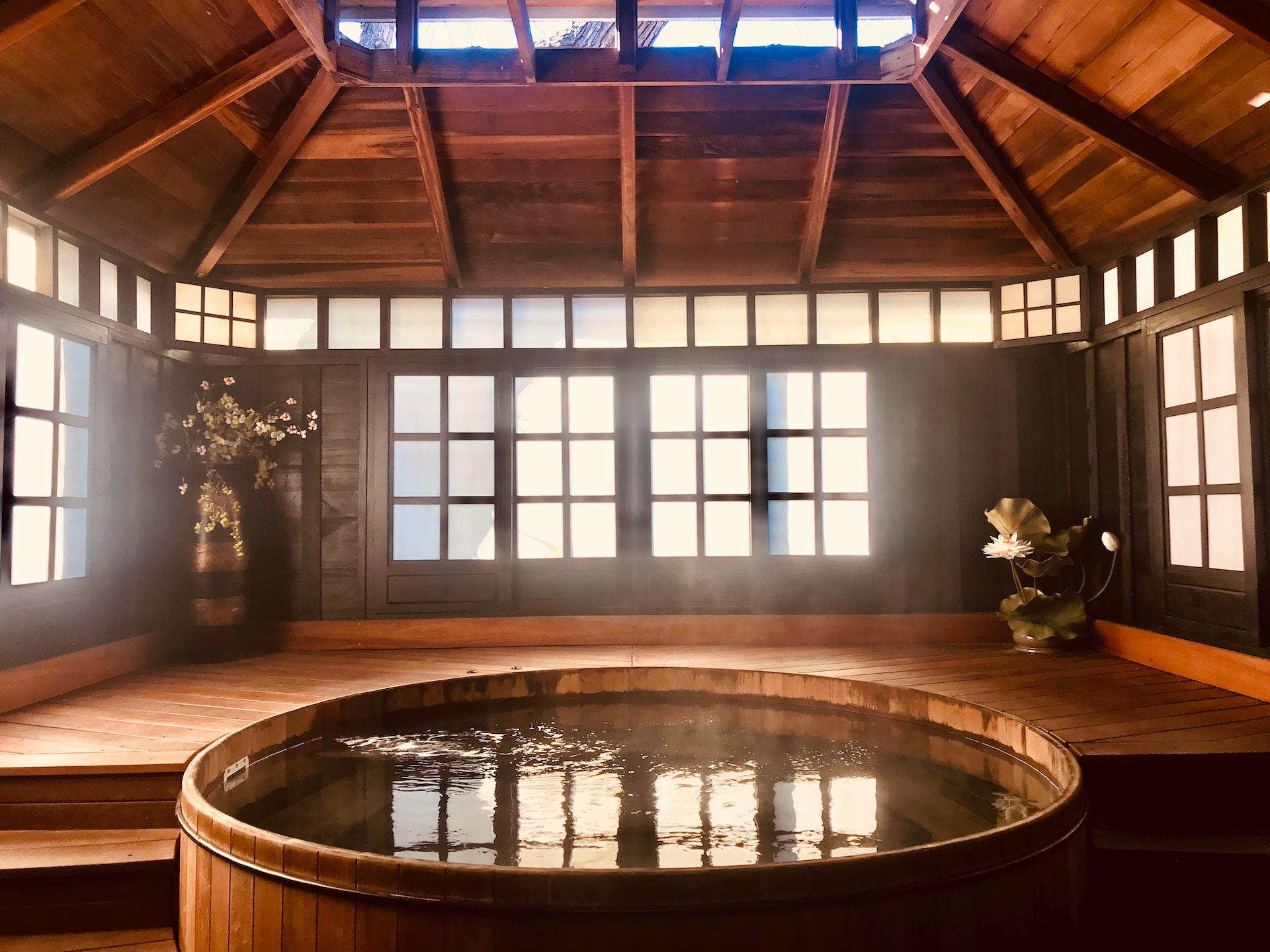 Photo by Cloris Ying on Unsplash. It's an image of a bathtub so magnificent it must've been crafted by an outer-wordly team