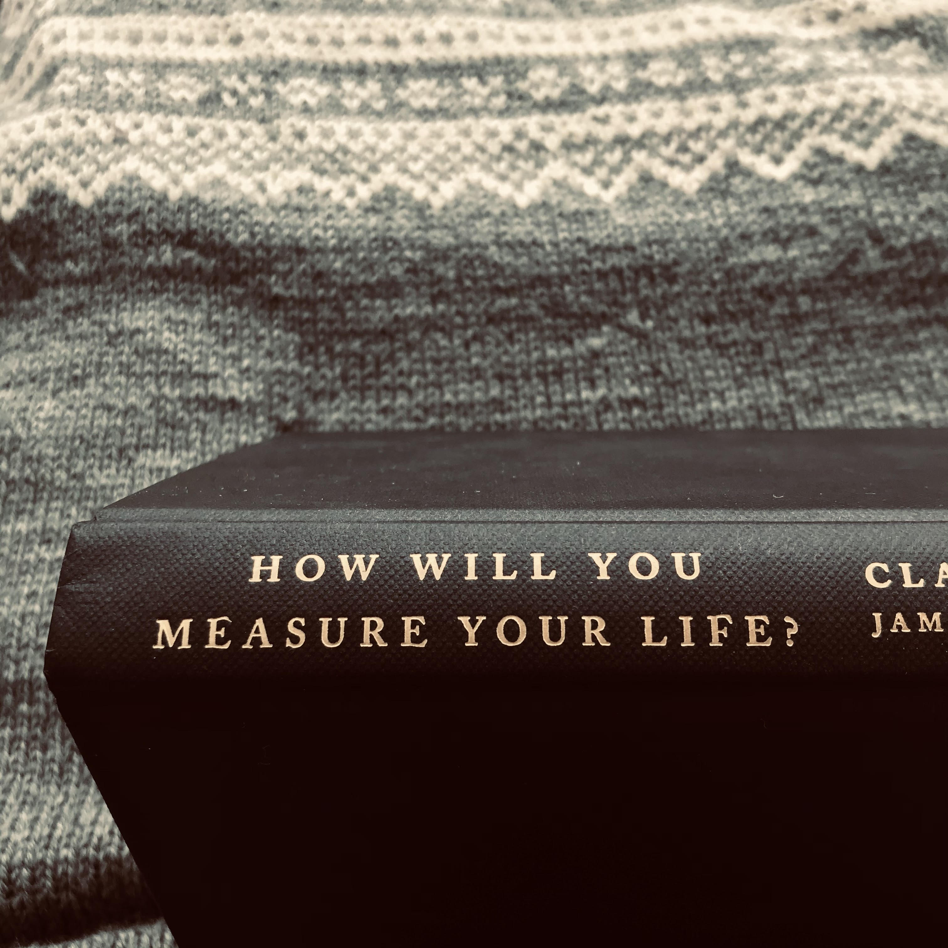 A photo of the book on my sweater.